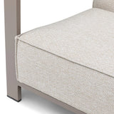 Light beige fabric sofa seat cushion with metal frame close-up