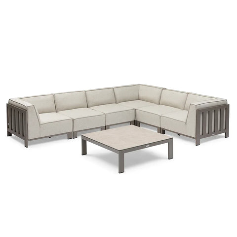 Beige outdoor corner sofa set with metal frame and matching low coffee table