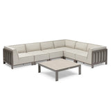 Beige outdoor corner sofa set with metal frame and matching low coffee table