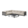 Beige outdoor corner sofa set with black metal frame and low square coffee table