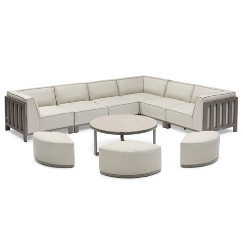 Beige outdoor corner sofa set with metal frame, three curved stools, and round coffee table