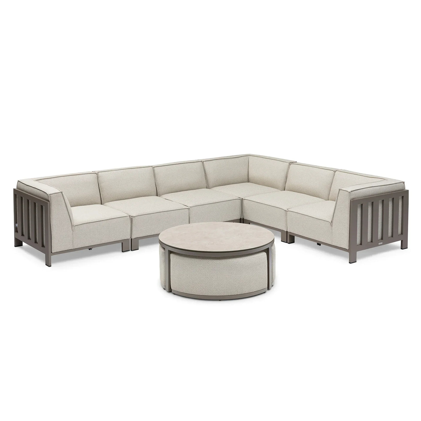 Beige modular corner sofa set with grey metal frame and round coffee table on white background