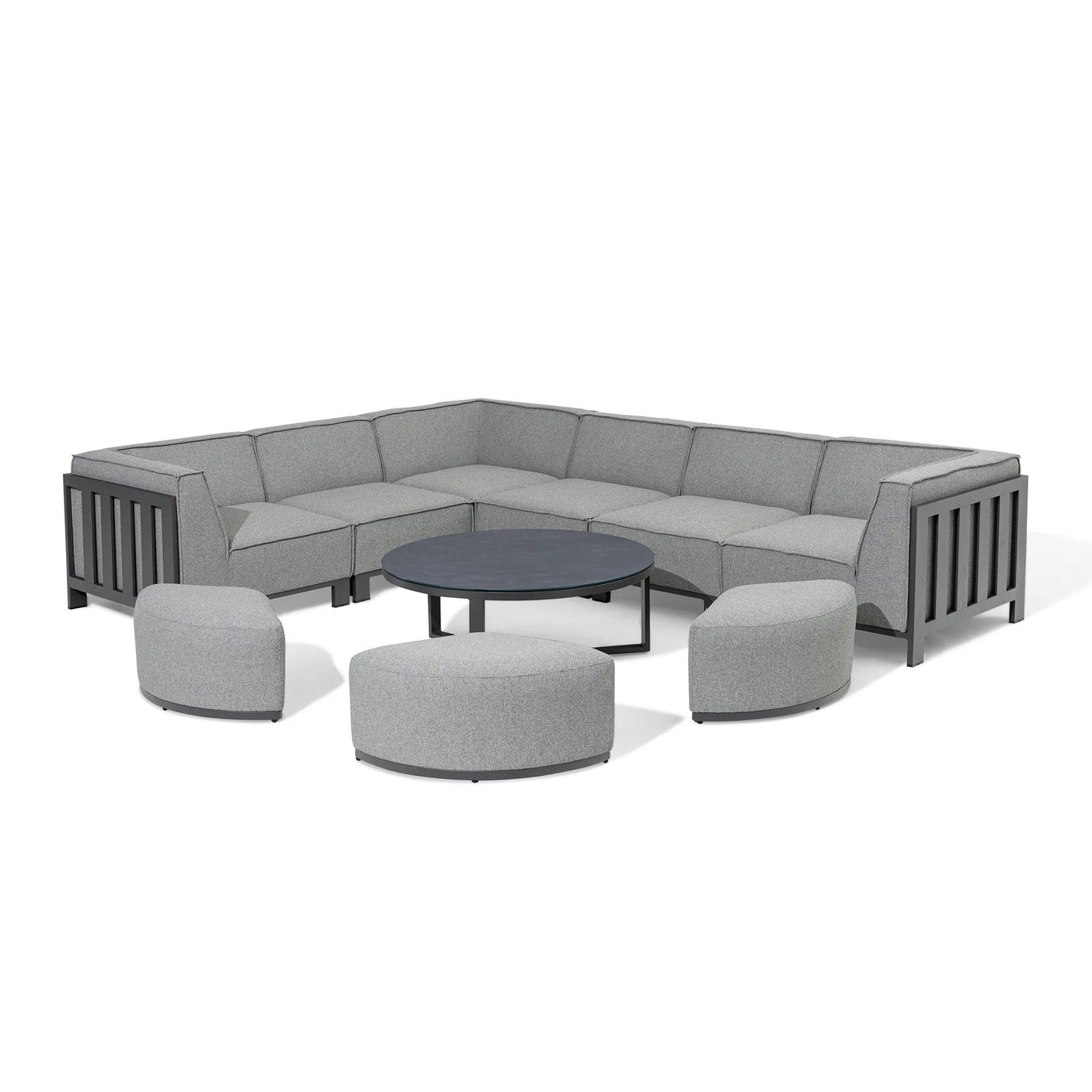 Grey corner sofa set with metal frame, round coffee table and three matching pouffes