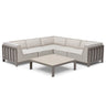 Beige corner sofa set with metal frame and low square coffee table on white background
