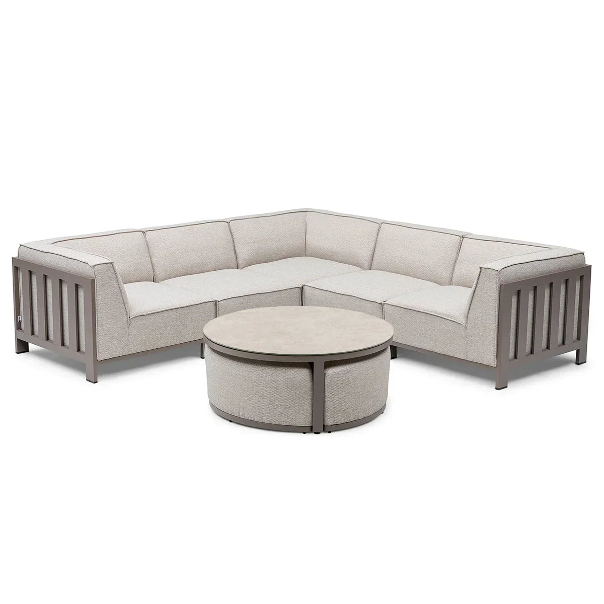 Beige fabric corner sofa with metal frame and round coffee table on white background