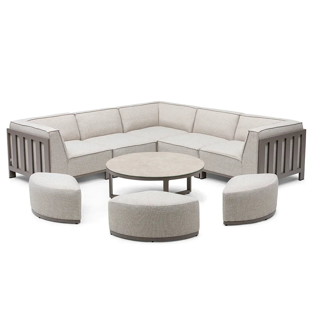 Beige sectional outdoor sofa set with three curved stools and round coffee table
