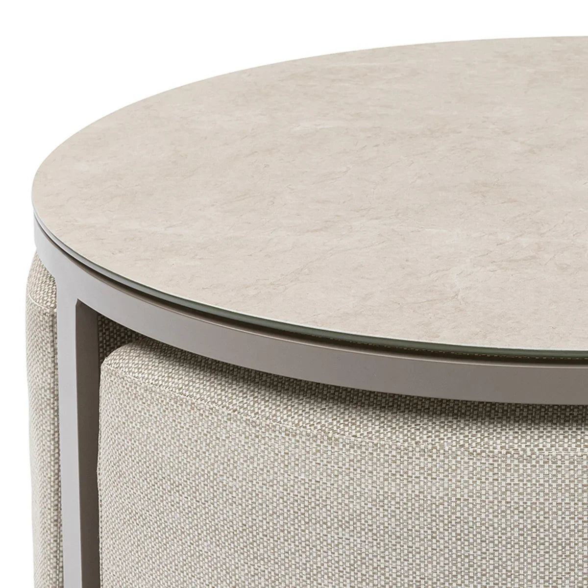 Round coffee table with beige stone effect top and textured fabric sides