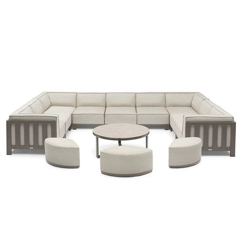 Beige outdoor corner sofa set with round coffee table and three curved stools