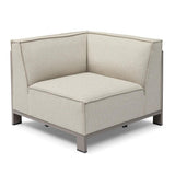 Beige fabric corner sofa unit with metal frame and low legs on white background