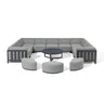 Grey modular corner sofa set with three ottomans and round black coffee table