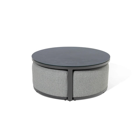 Round fabric and metal coffee table with dark top and light grey sides