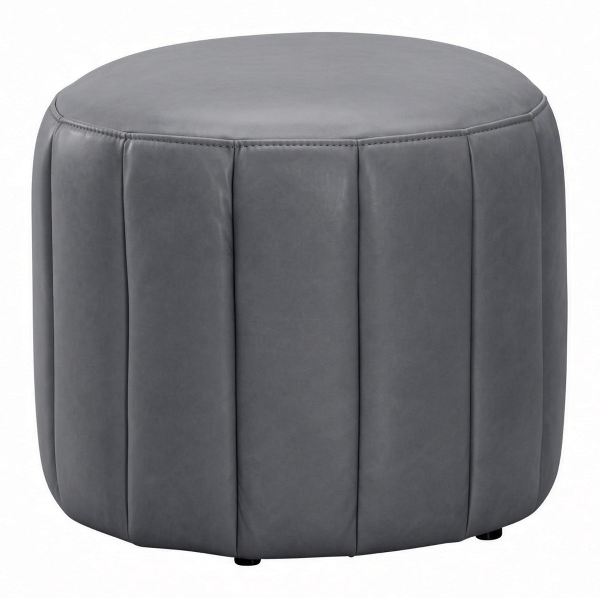 A round gray upholstered ottoman with vertical channel tufting and small black feet, shown on a plain white background.