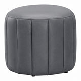 A round gray upholstered ottoman with vertical channel tufting and small black feet, shown on a plain white background.