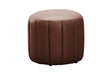 A round brown faux leather ottoman with vertical channel tufting on a solid white background.