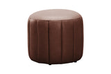 A round brown faux leather ottoman with vertical channel tufting on a solid white background.