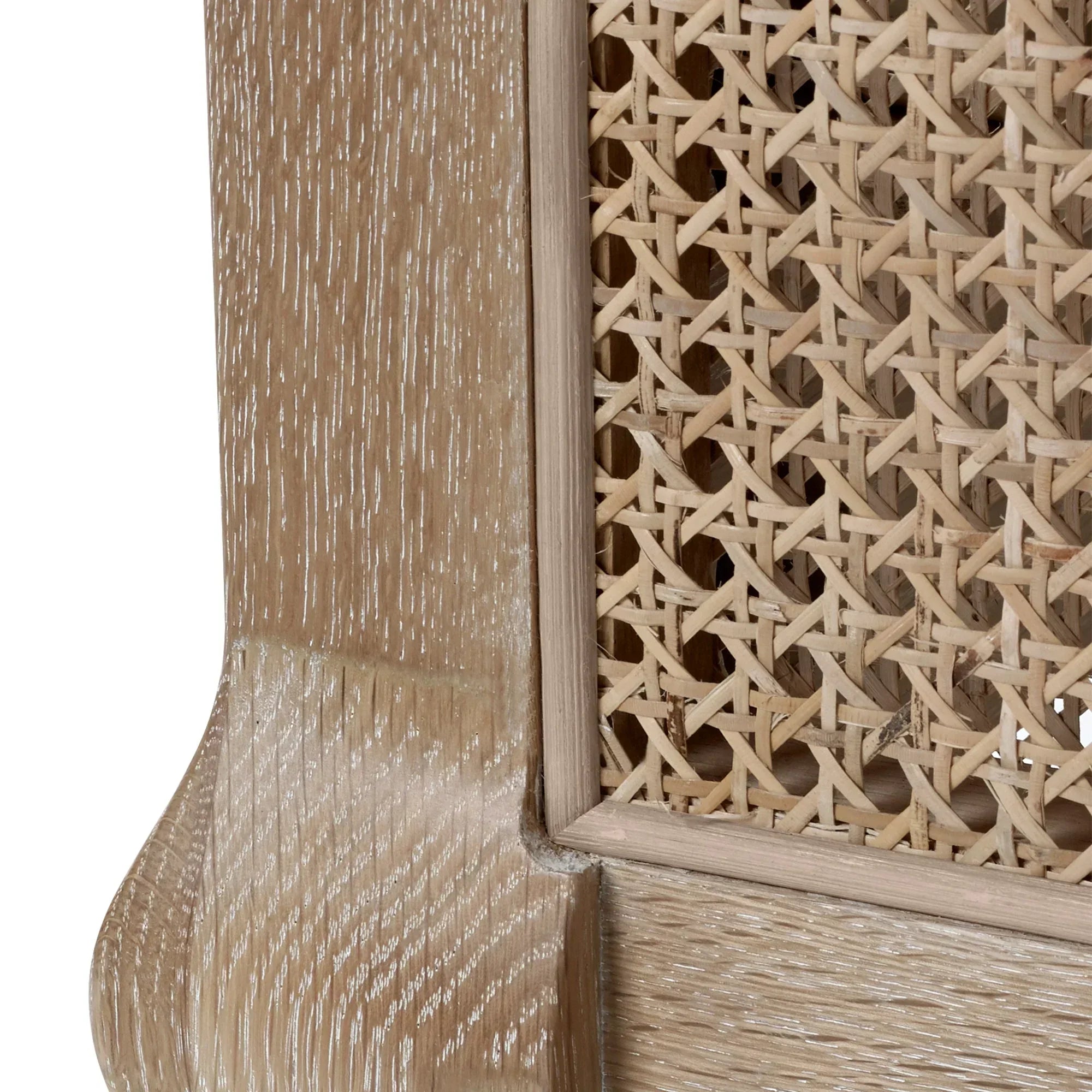 Close-up of oak furniture with natural rattan cane panel and wood grain texture detail