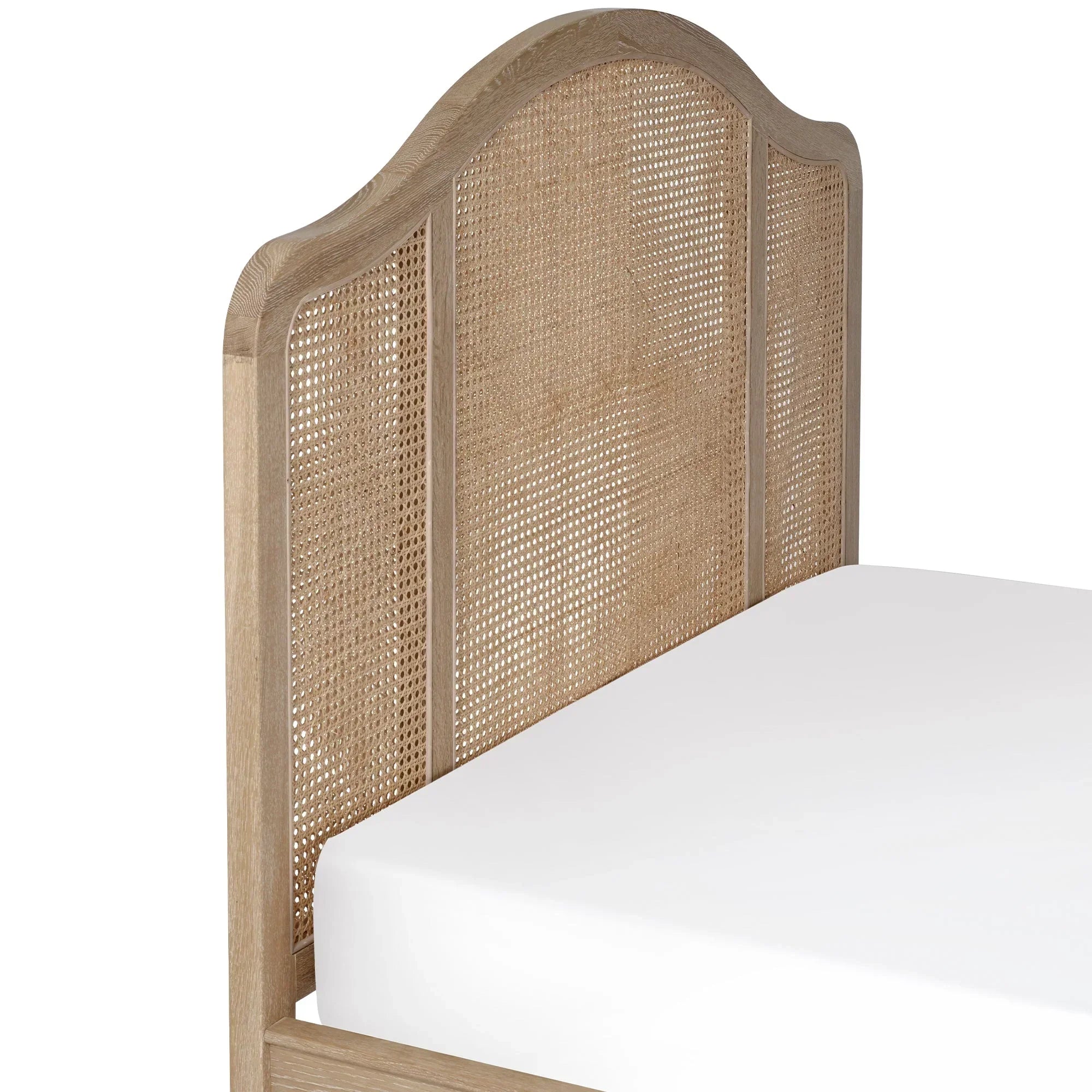 Natural wood bed frame with woven rattan headboard and white mattress, angled view