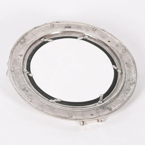 Back view of round metal porthole mirror with visible mounting brackets and fixings
