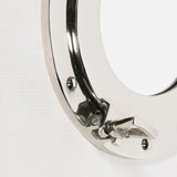 Close up of chrome furniture handle with latch and screw details on white background