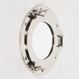 Round porthole wall mirror with polished chrome frame and secure hinge detail