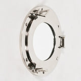 Round porthole wall mirror with polished chrome frame and secure hinge detail