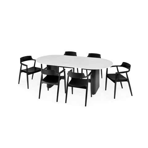 Six black wooden dining chairs with curved backrests arranged around white oval table with textured black base.