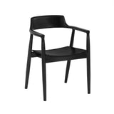 Black wooden dining chair with curved back and armrests side angled view on white background