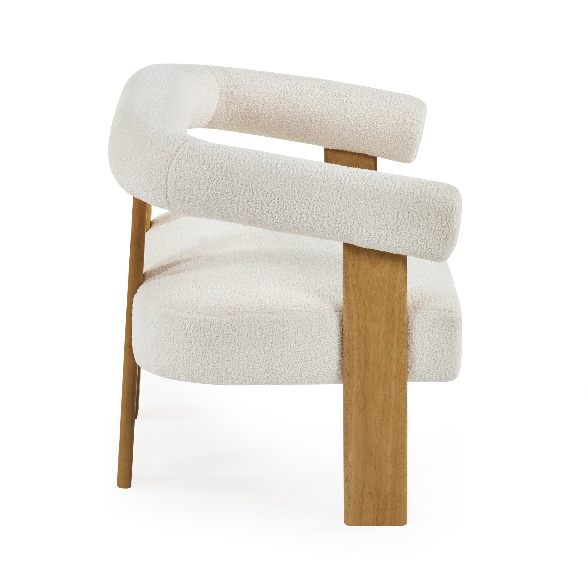 Side profile of cream boucle sofa highlighting tubular backrest and solid light wood legs on white background