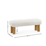 Low bench with cream textured upholstery and four rounded natural wooden legs with dimension markings on white background