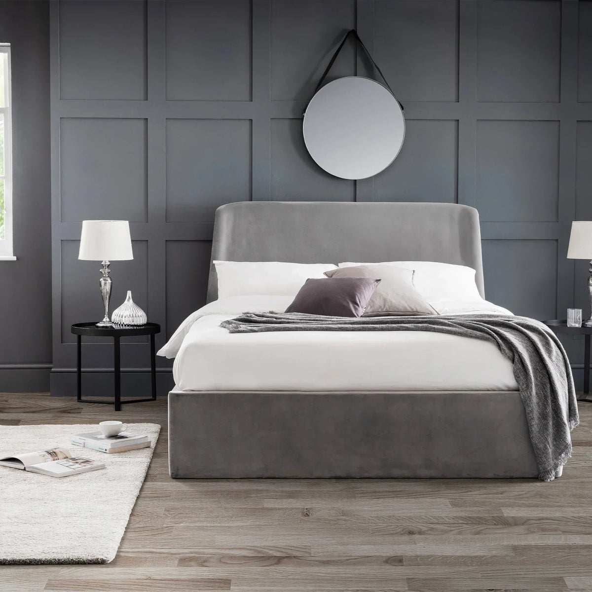 Grey ottoman storage bed king size with headboard in modern bedroom setting