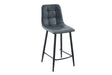 A modern bar stool with a dark gray tufted velvet seat and backrest, supported by slim black metal legs and a footrest, shown against a plain white background.