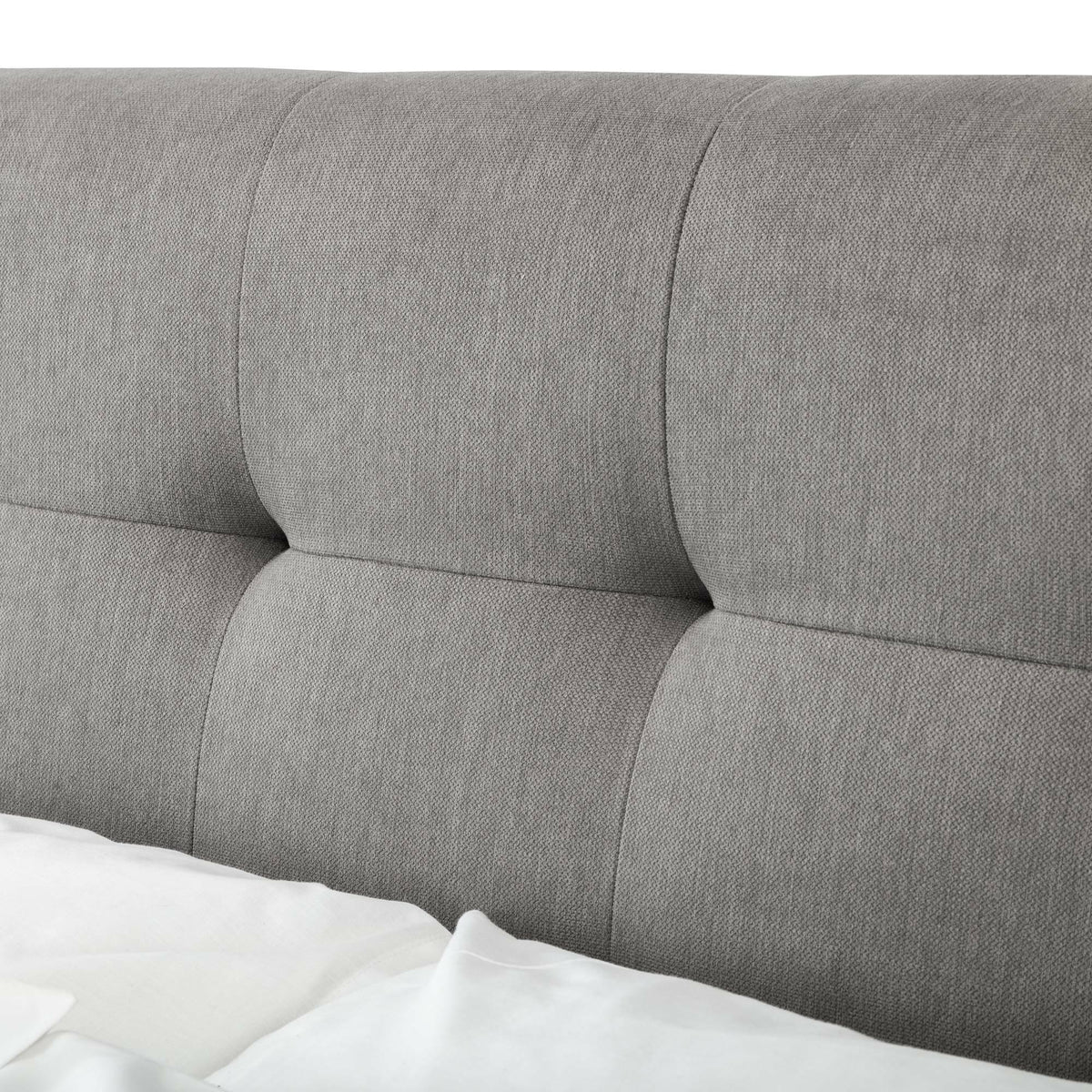 Upholstered grey double bed headboard with stitched panel detail