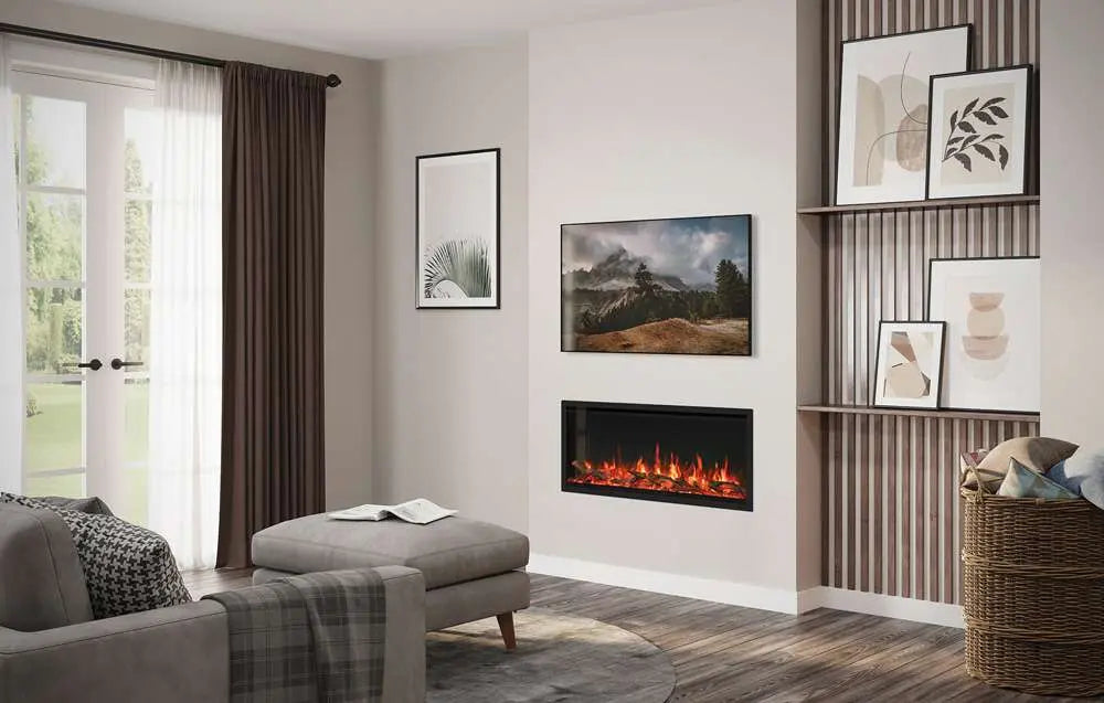 Modern electric fire installed in a stylish living room with a cozy sofa and decorative wall art.