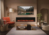 Modern electric fire installed in a stylish living room with a scenic artwork above, featuring a warm glow and contemporary