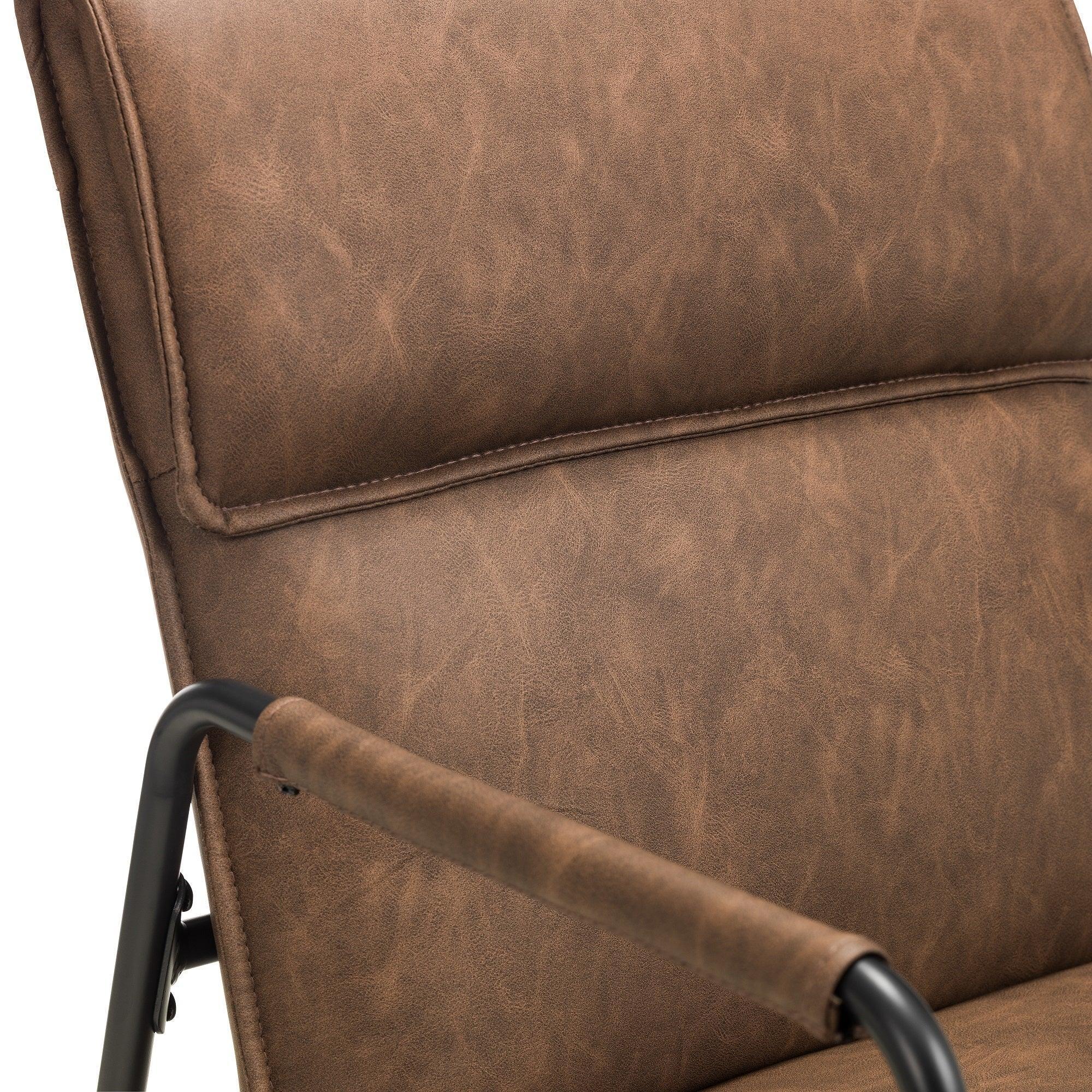 Close detail of brown faux leather Gramercy chair backrest with padded metal armrest