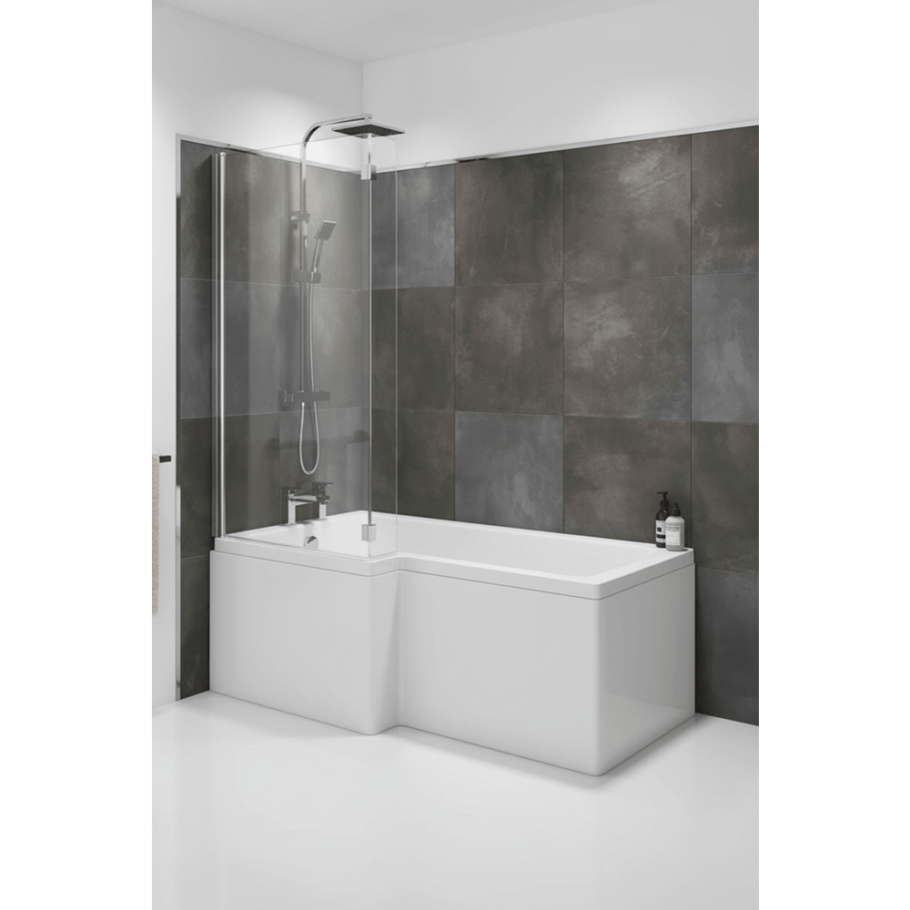 Modern bathroom with a white bathtub against a gray tiled wall.