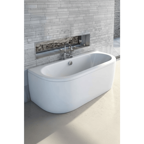 Modern freestanding bathtub in a bathroom setting with tiled wall and floor.