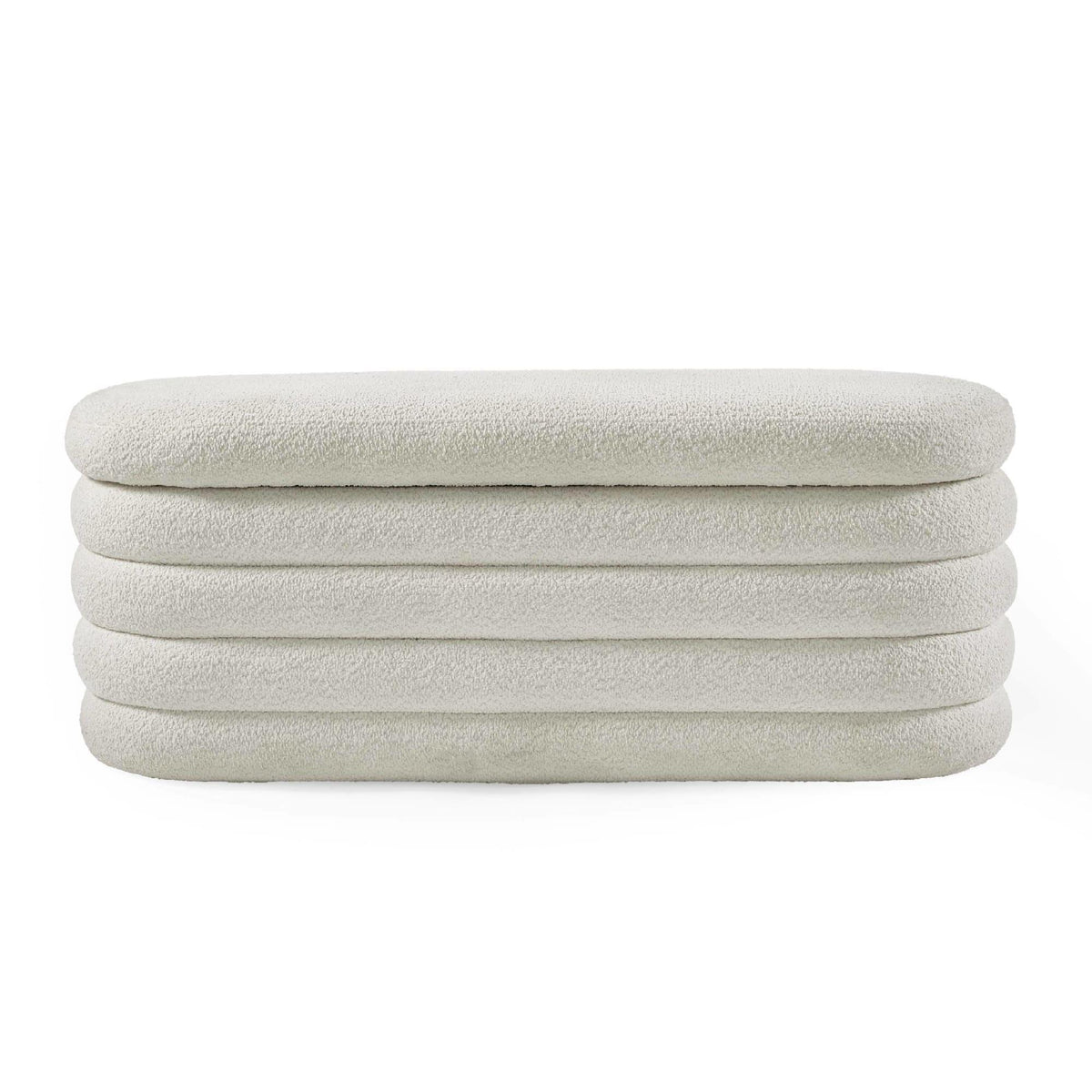Cream textured ottoman bench with rounded, layered upholstery design