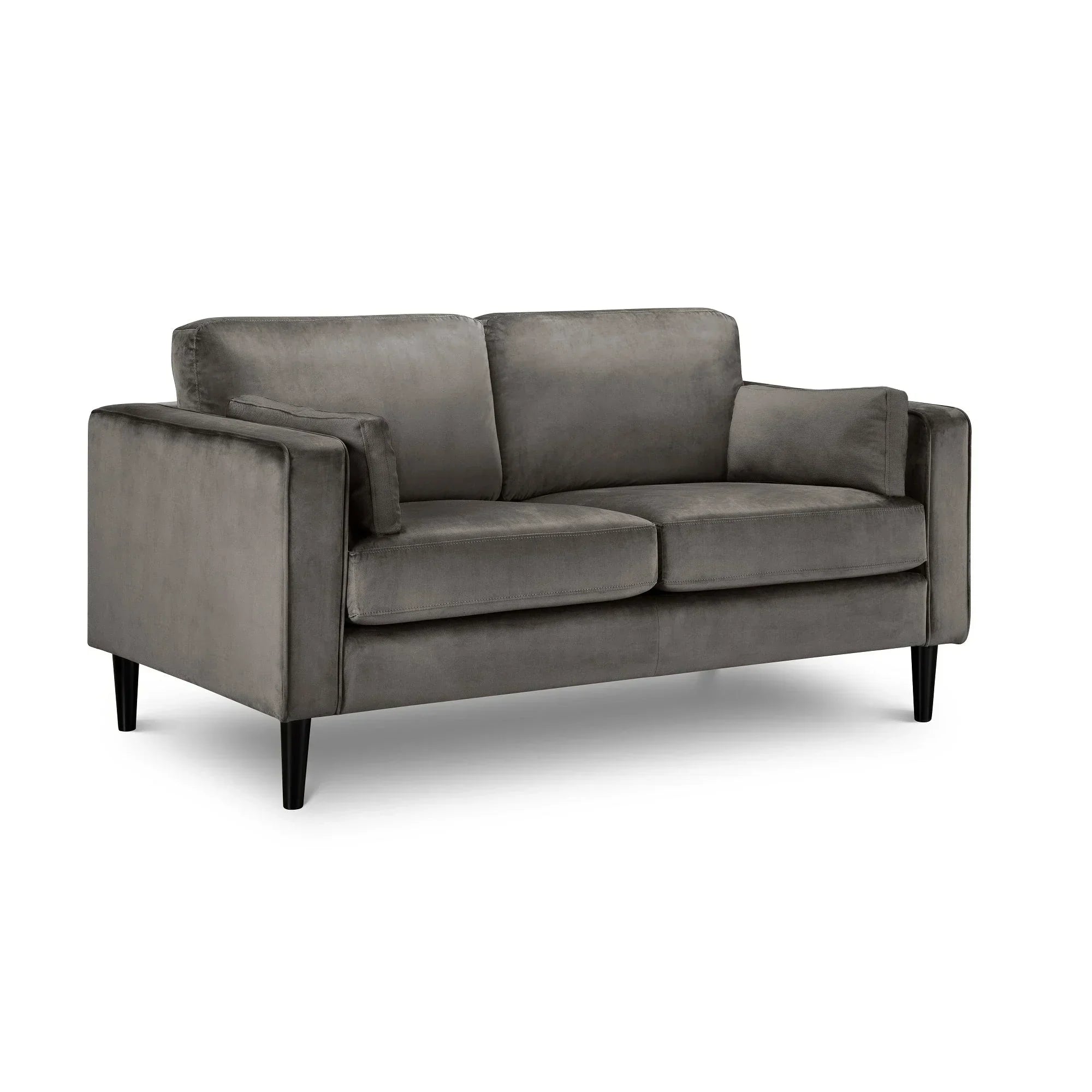 Grey velvet two seater sofa with black tapered legs and square armrests on white background