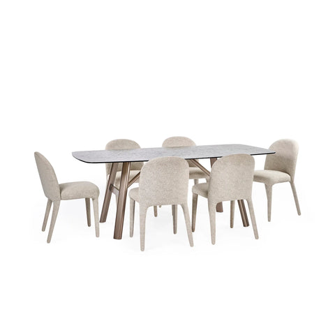 Modern dining table with marble-effect top and six beige upholstered dining chairs