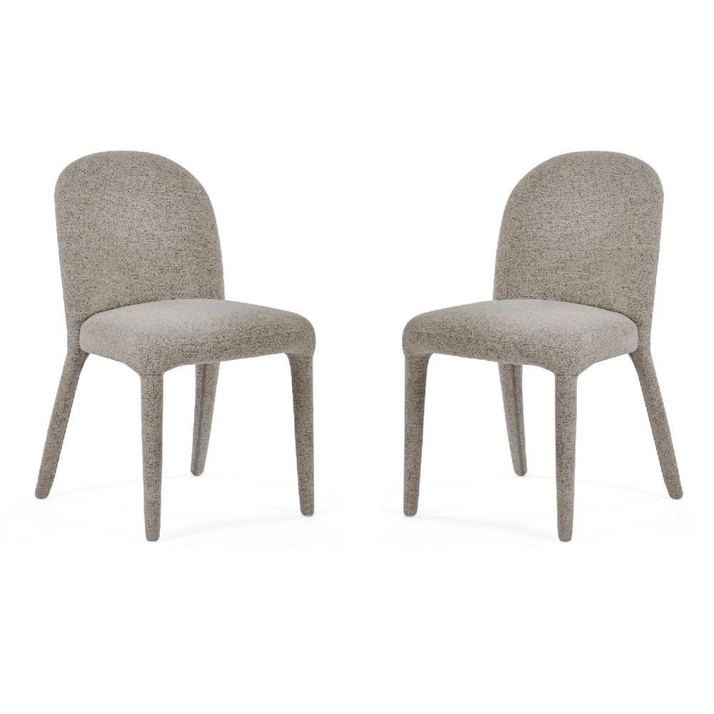 Pair of upholstered dining chairs in light grey boucle fabric with rounded backs and cushioned seats