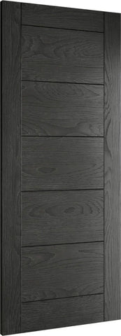 Black wood panel interior door with horizontal grooves and visible wood grain texture