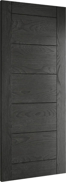 Black wood panel interior door with horizontal grooves and visible wood grain texture