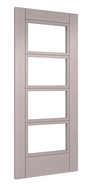 Light grey ash internal door with four clear glass panels, modern vertical grain finish