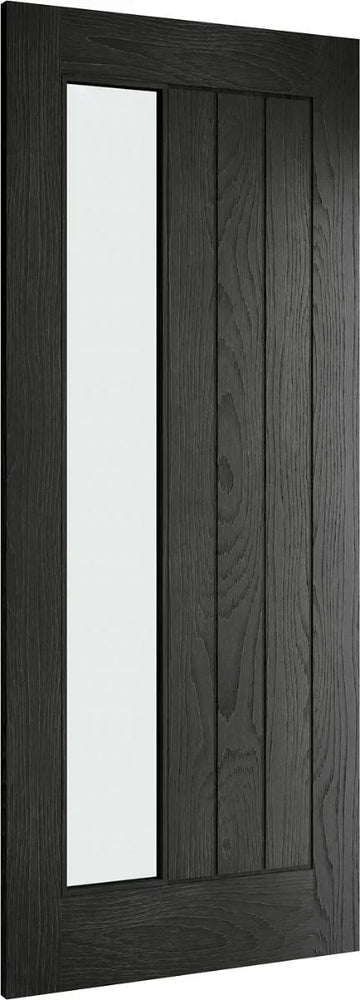 Black wood internal door with vertical frosted glass panel and grooved design