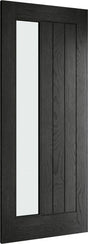 Black wood internal door with vertical frosted glass panel and grooved design