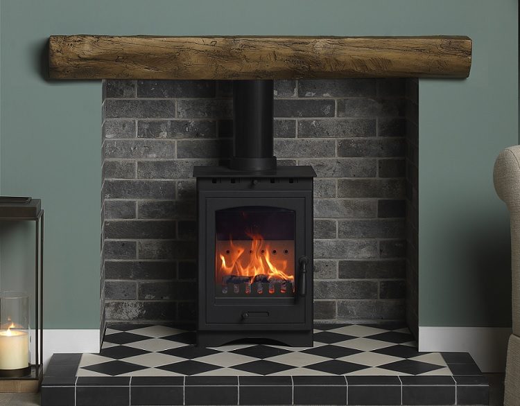 Helios 5 Eco multifuel stove in living room setting | Home Centre Direct UK