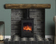 Helios 5 Eco multifuel stove in living room setting | Home Centre Direct UK