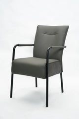 Grey dining chair with padded seat, black metal legs and armrests on white background