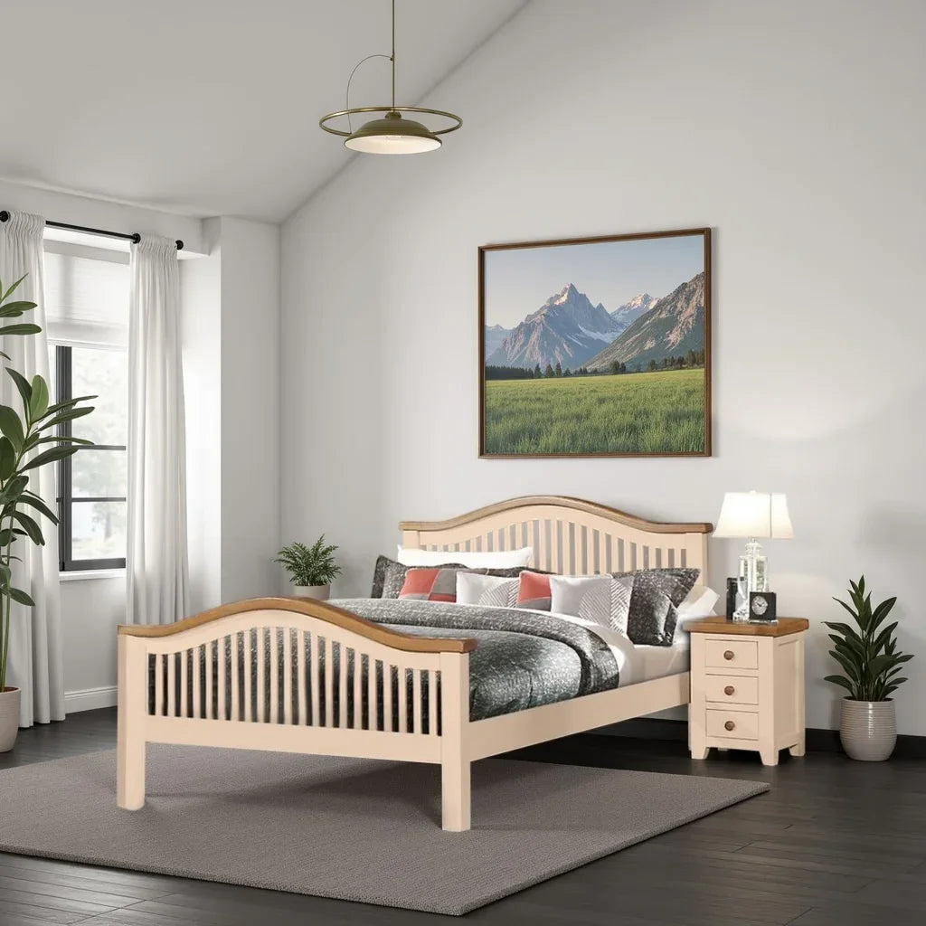 Light wood bed frame with slatted headboard in modern bedroom with bedside table and lamp